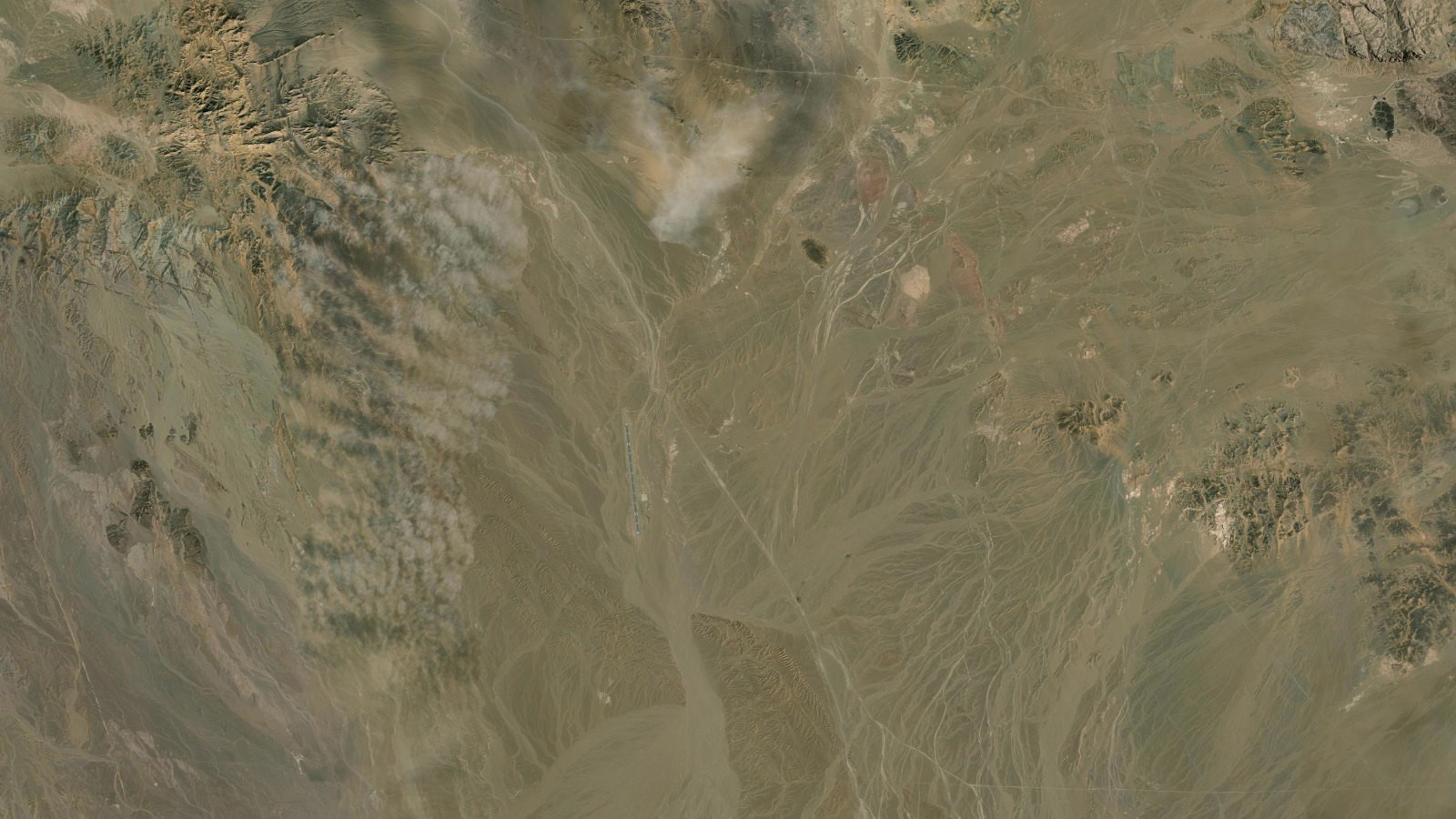 Satellite view of the arid Chagai desert of western Balochistan, Pakistan, the remote copper-gold country around the Reko Diq deposit near the Iran and Afghanistan borders.